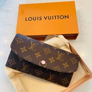 New and unused Louis Vuitton Emilie Wallet